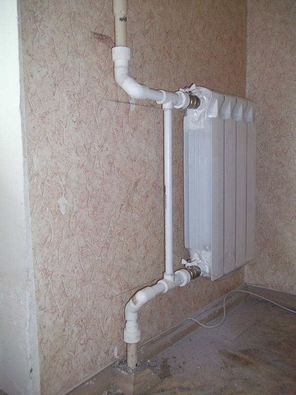 Монтаж радиатора отопления на стену. Схема подключения радиаторов отопления.